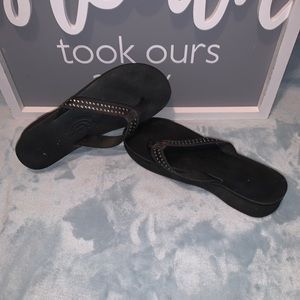 Women’s rainbow flip flops